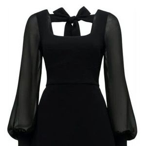 Beautiful black dress with pretty bow tie by the nape.